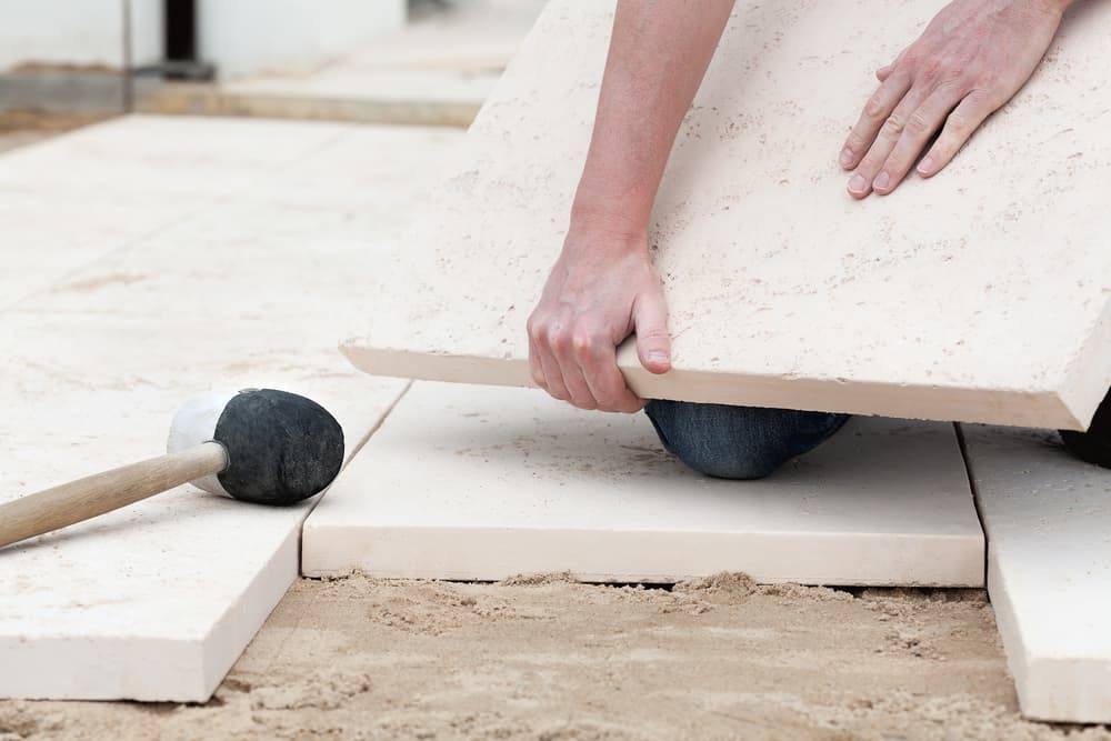 Montage a new concrete slab on a ground